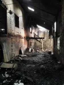 Fire damaged barn inside